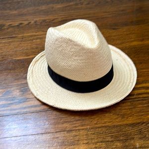 Straw fedora hat with black ribbon